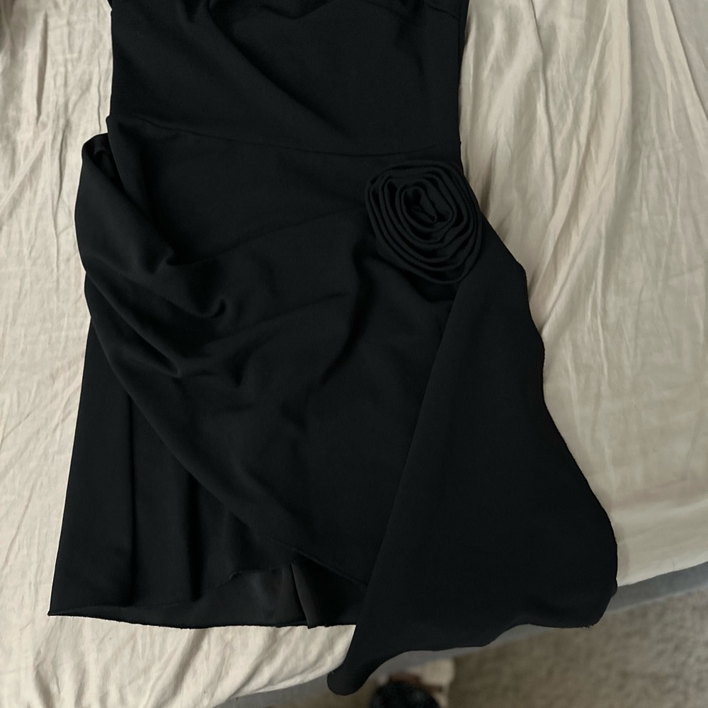 Elegant Black Dress with Floral Detail